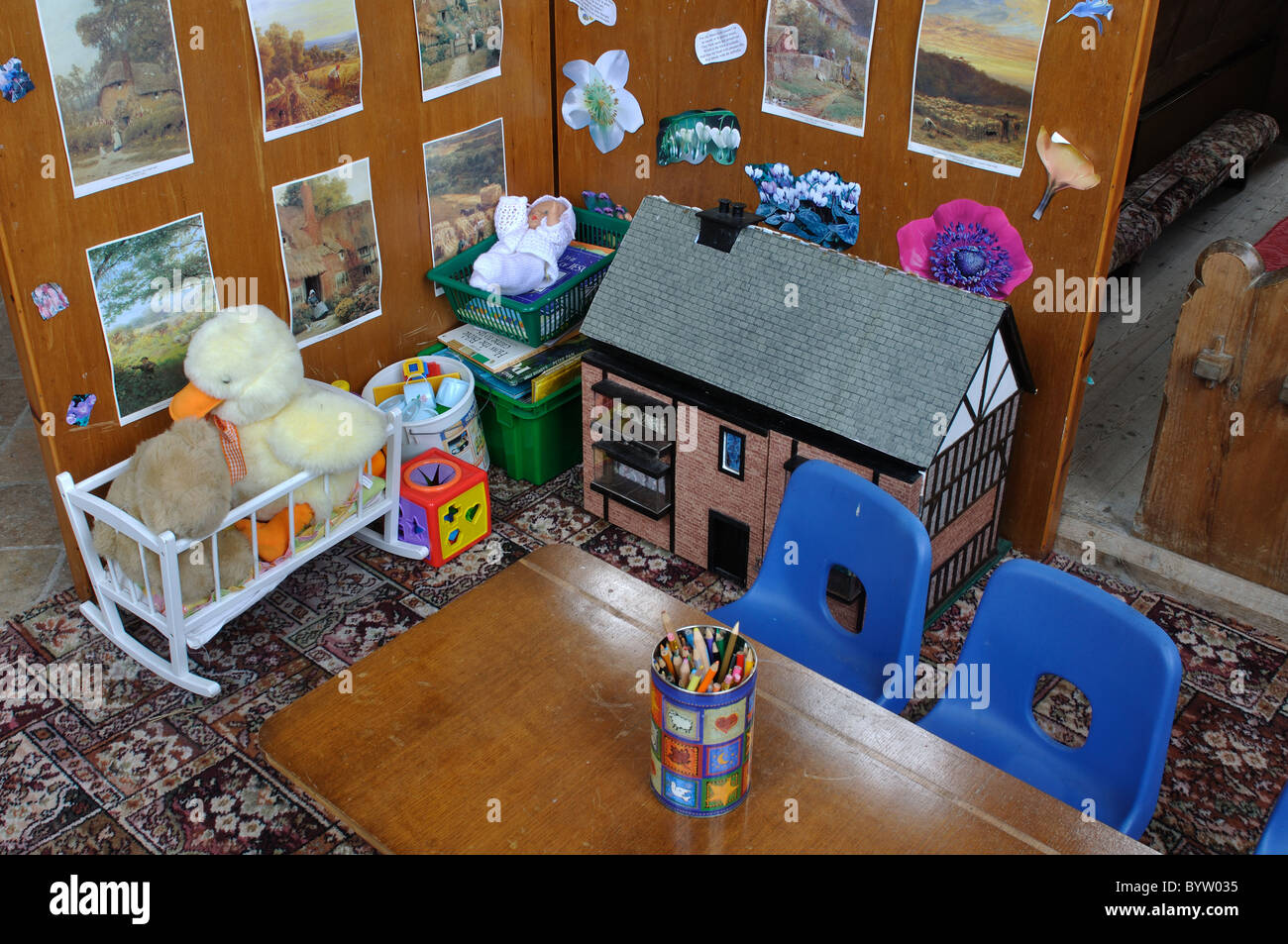 Area giochi per bambini in una chiesa Foto Stock