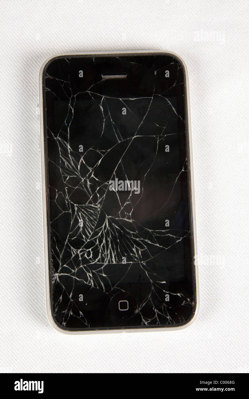 Schermo rotto e incrinato su iphone. Danneggiato il telefono cellulare. 103986 iphone Foto Stock