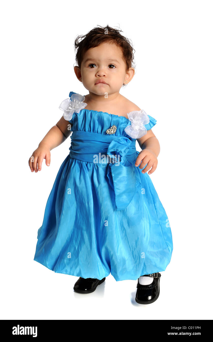Ritratto di bella ragazza ispanica nel vestito blu isolate su sfondo bianco Foto Stock