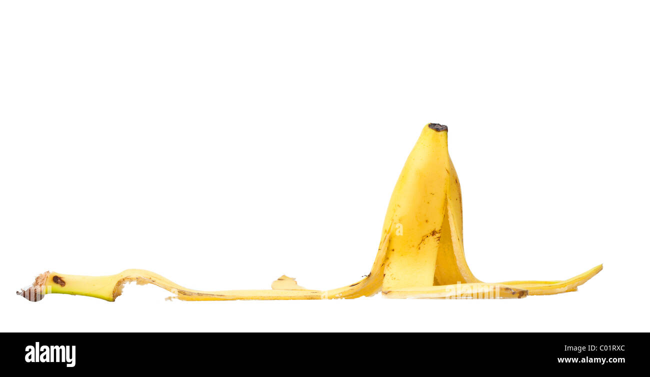 Buccia di banana isolata contro uno sfondo bianco Foto Stock