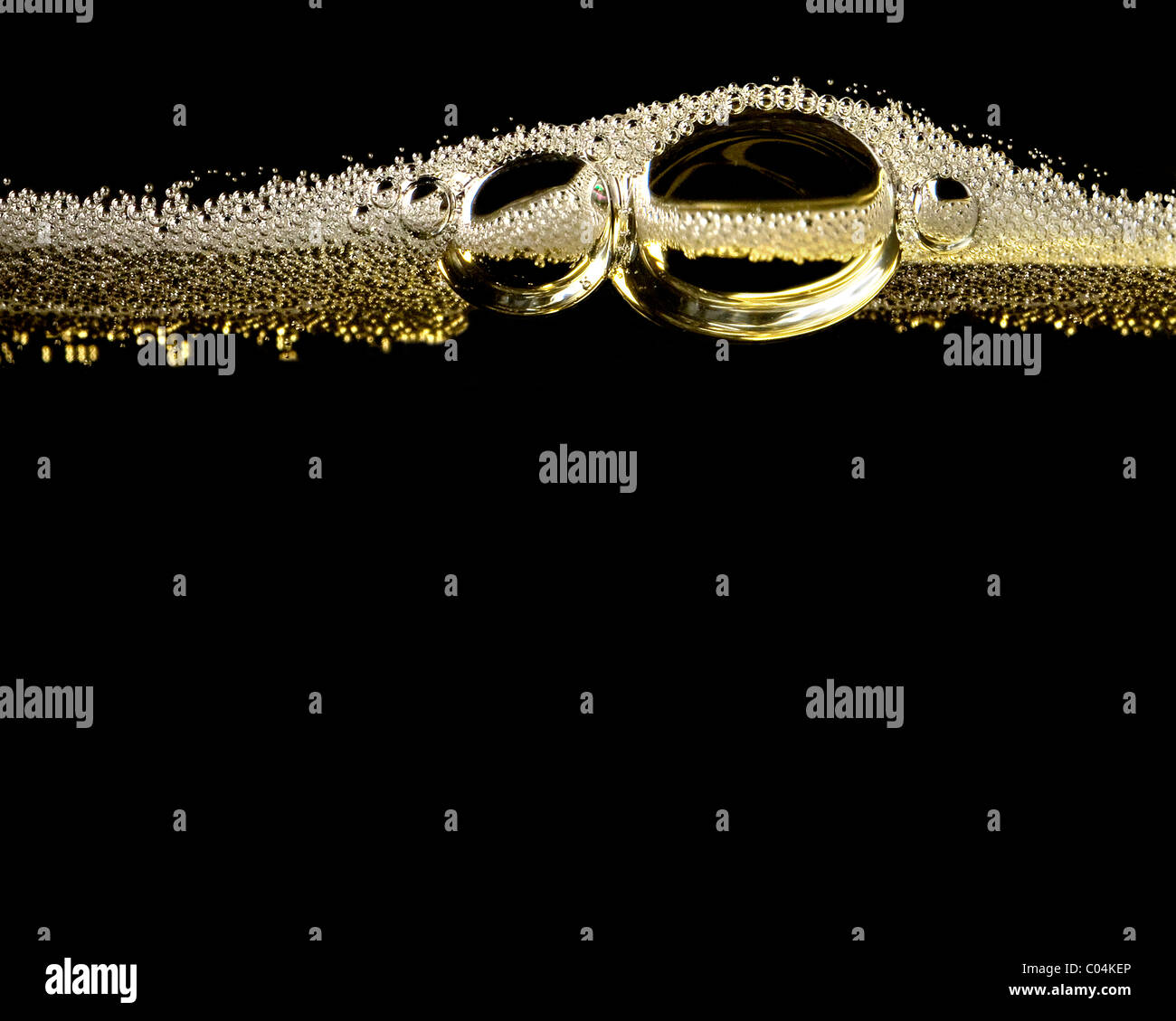 Close up di bolle di champagne Foto Stock