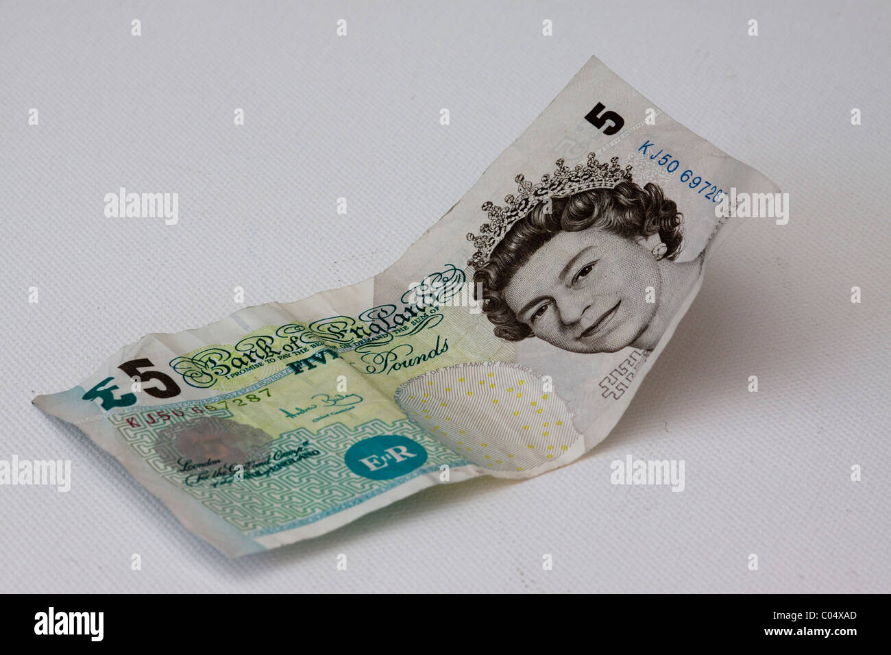 Un britannico cinque Pound nota su bianco Foto Stock
