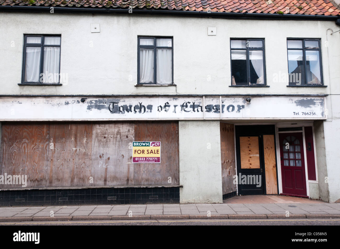 Un negozio di vuoto in King's Lynn, Norfolk, Inghilterra Foto Stock