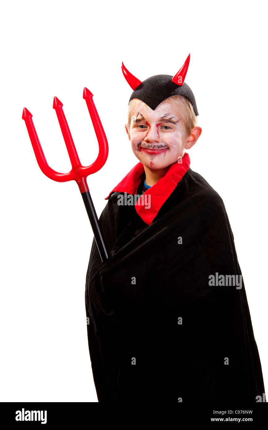Il ragazzo, 6 anni, vestito come un diavolo, con trident Foto Stock