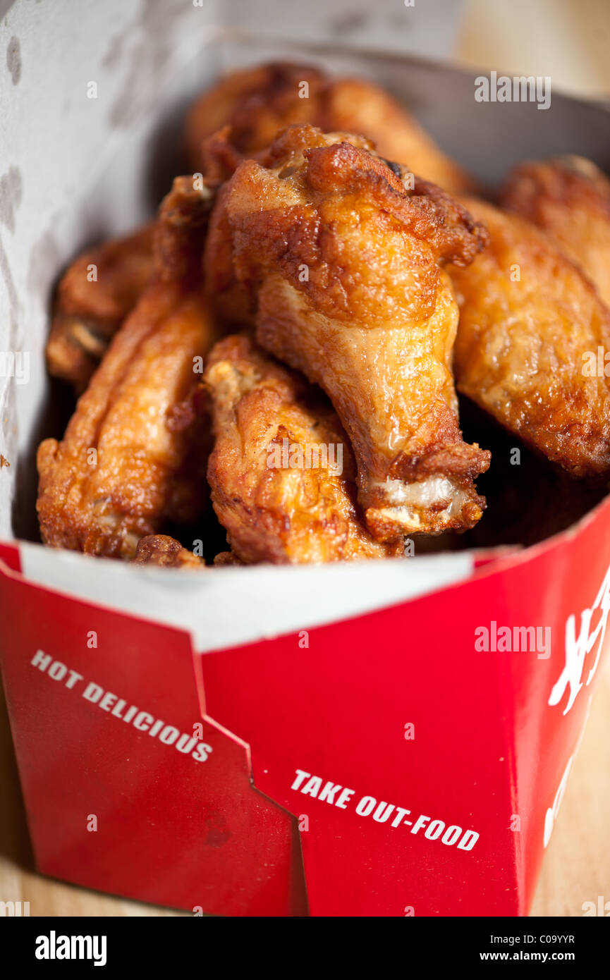 Close up di alette di pollo fritte Foto Stock