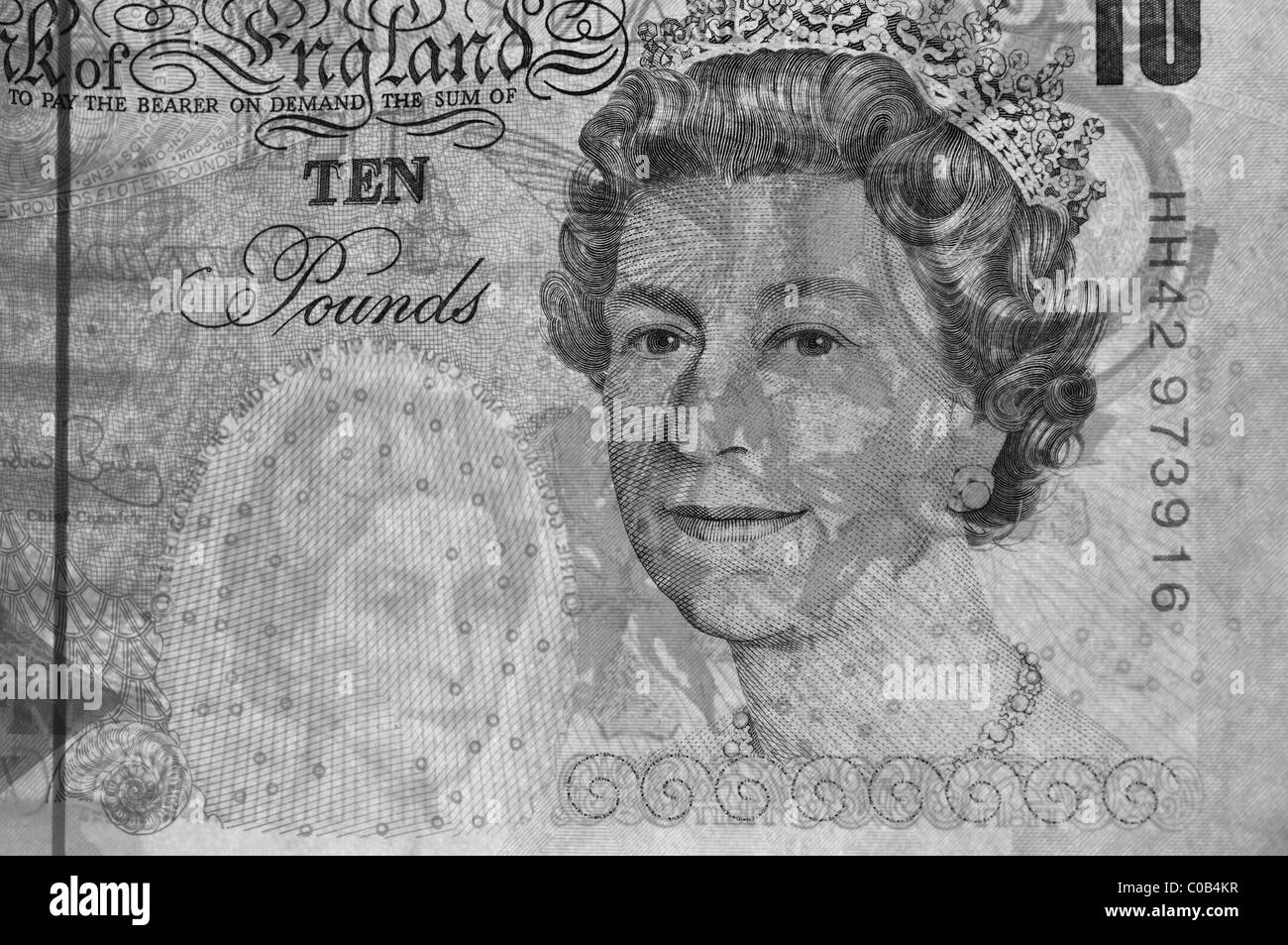 British dieci pound nota ,denaro in bianco e nero , che mostra la filigrana ,close up ,dettaglio ,back lit Foto Stock