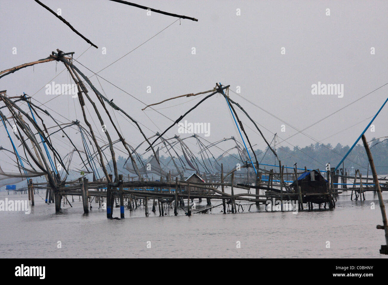 Cinese di reti da pesca in Kerala, India Foto Stock