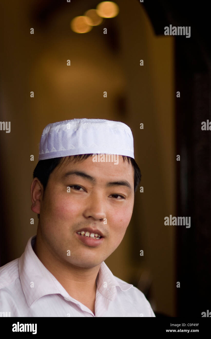 Musulmani chef di tagliatella a Hang Zhou, nella provincia di Zhejiang in Cina. Foto Stock