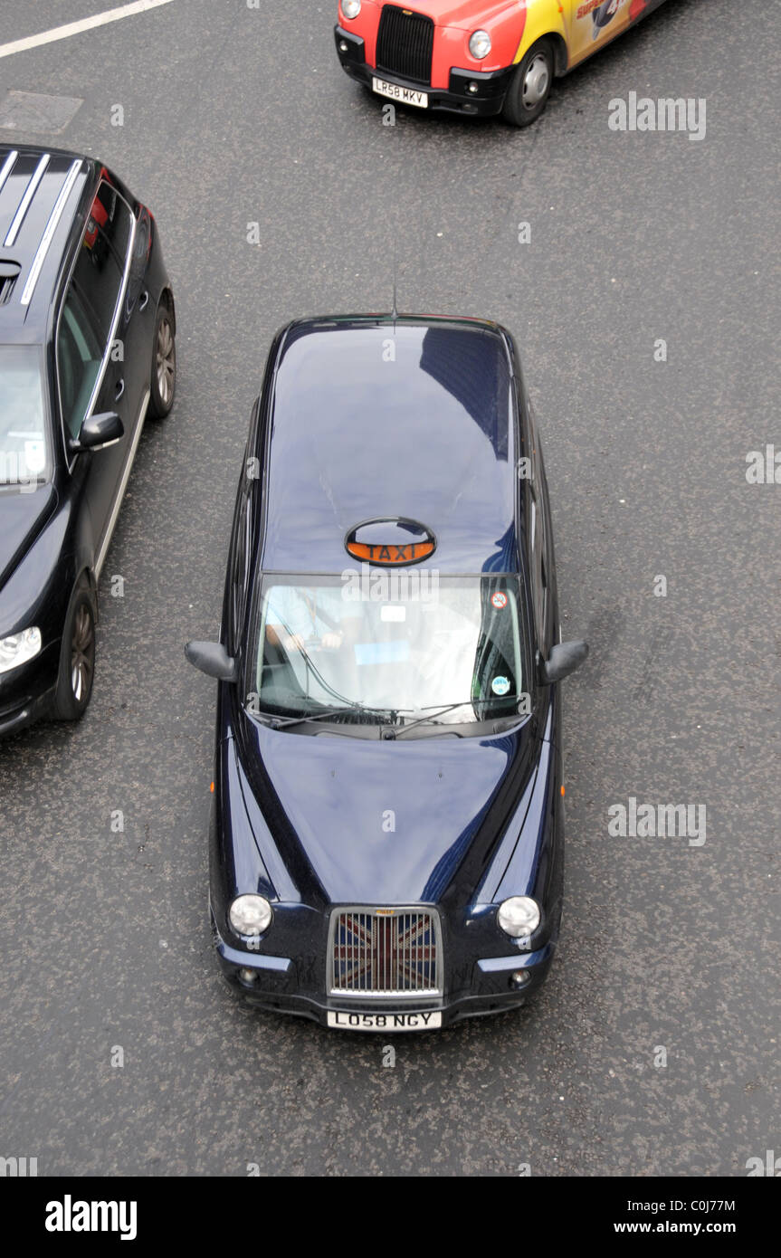 London Black Cab tassista Cab Driver Tariffa taxi I taxi Foto Stock