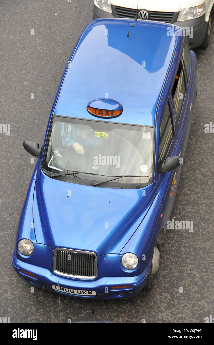 Cabina di Londra tassista taxi auto tariffa traffico Foto Stock