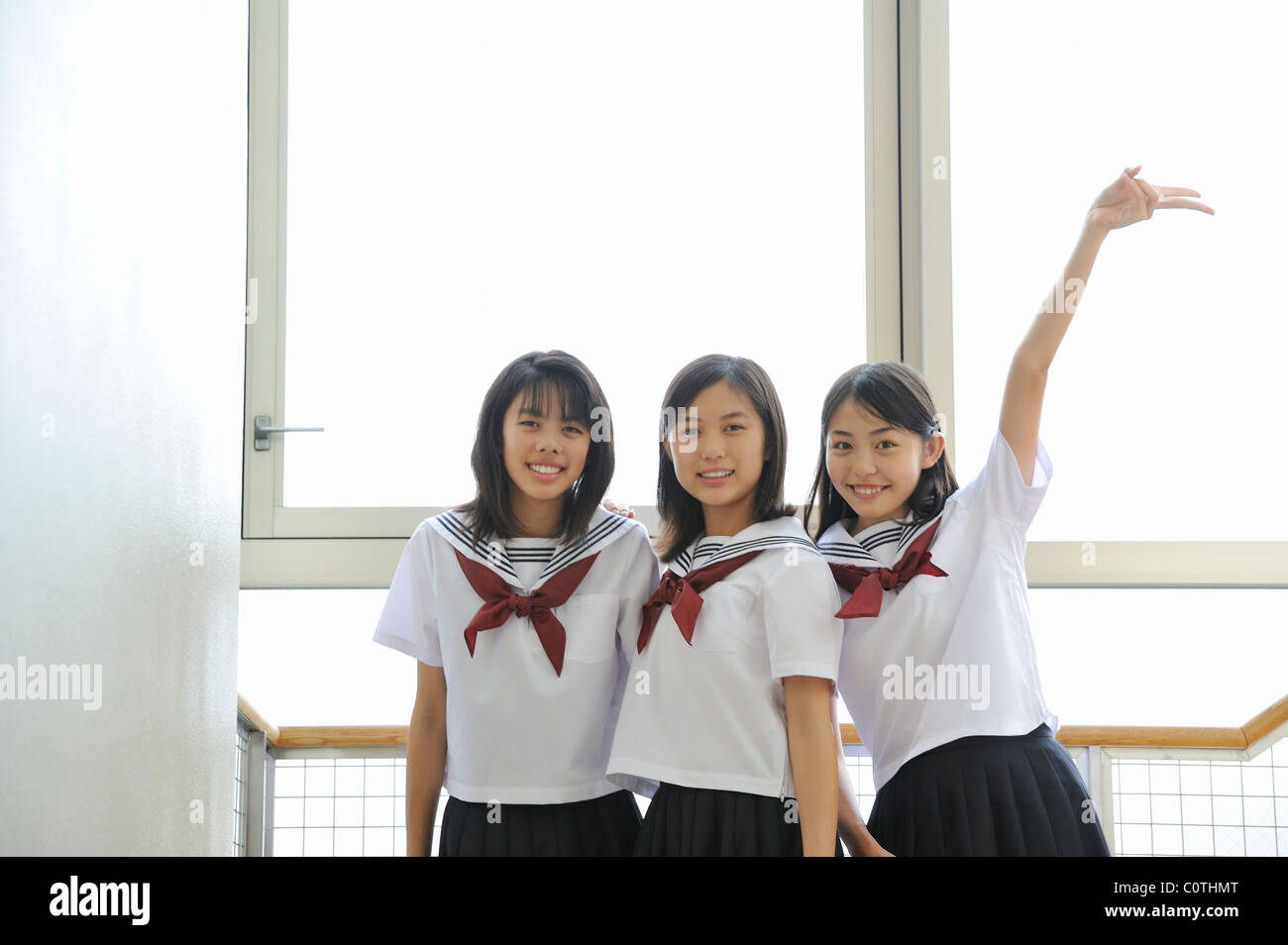 Alta scuola ragazze sorridenti Foto Stock