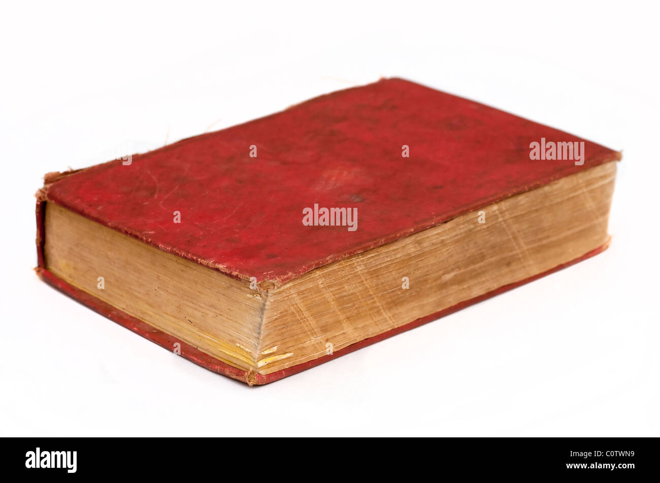 Vecchio libro rosso isolato su uno sfondo bianco Foto Stock