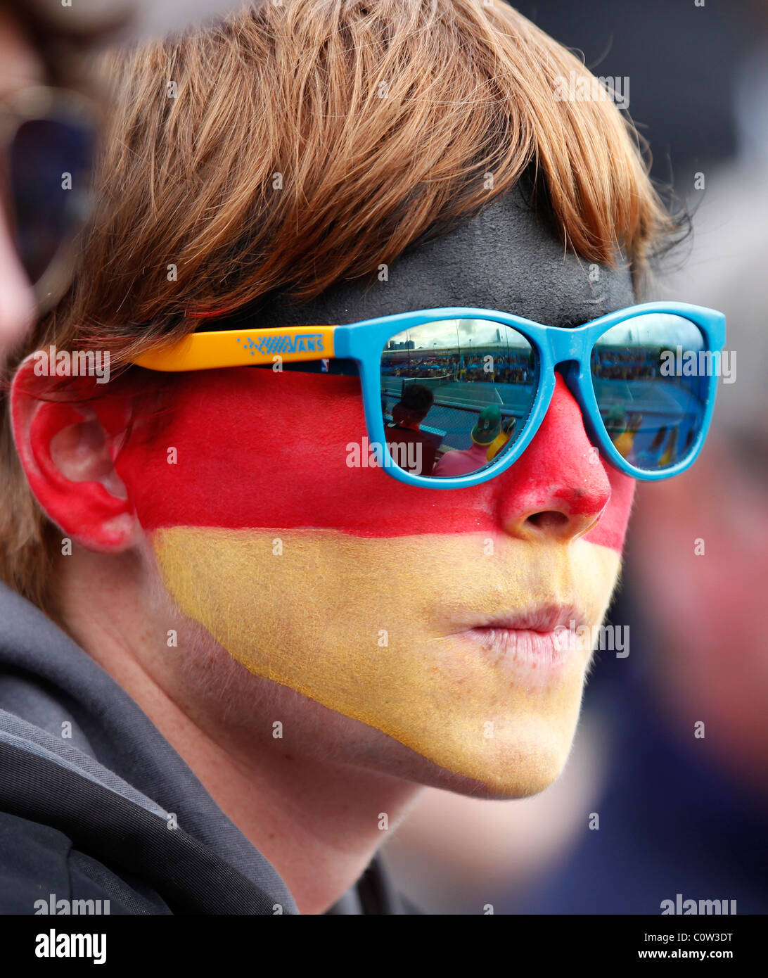 Femmina tedesco fan di tennis con face painting presso l'Australian Open 2011. Foto Stock