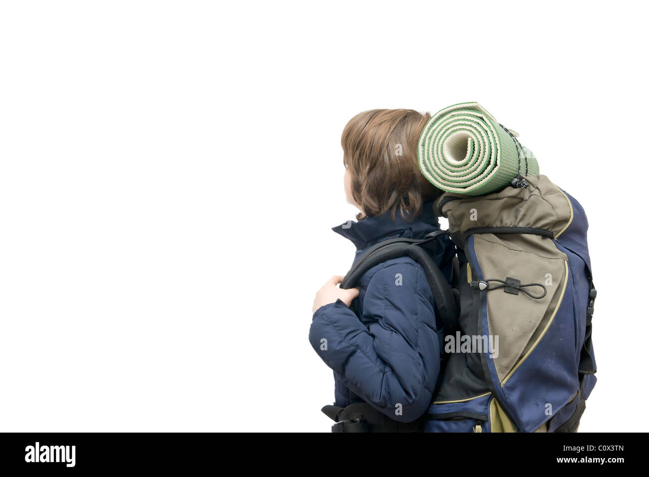 Bambino con uno zaino pronto per un viaggio isolato su bianco Foto Stock