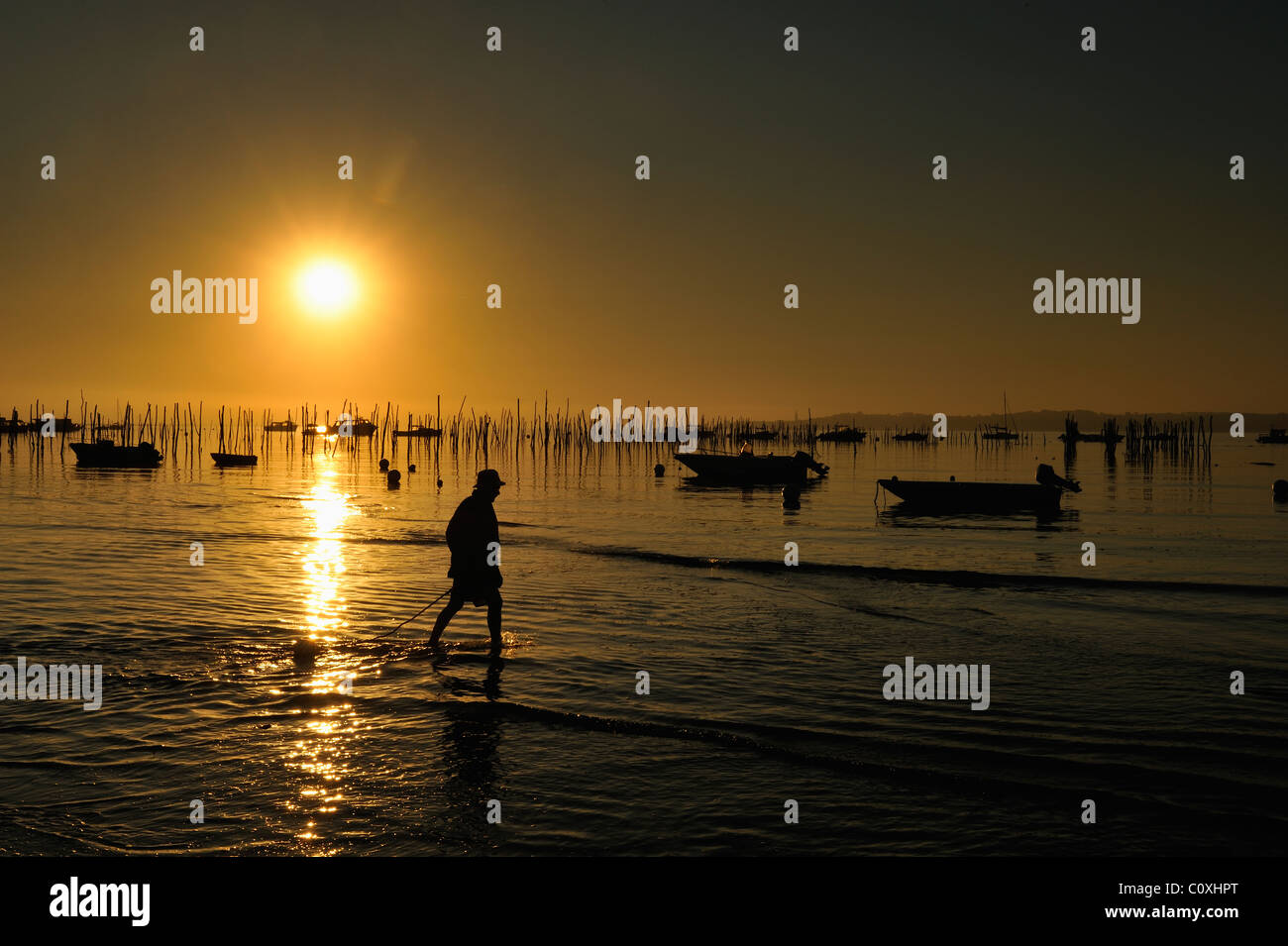 Tramonto sulla baia di Arcachon, Cap Ferret, Dipartimento della Gironde, Francia Foto Stock