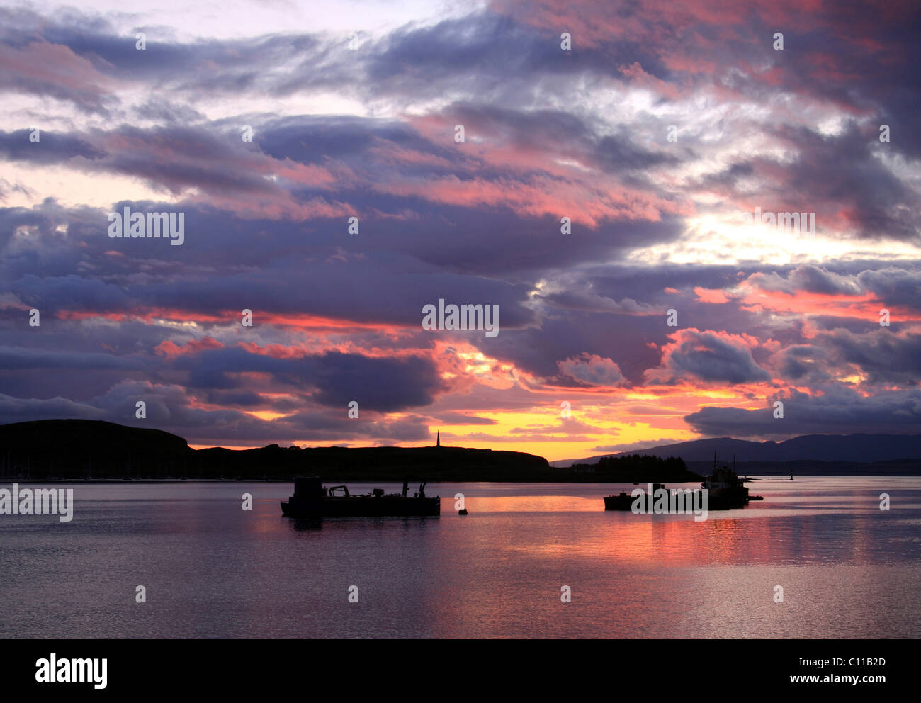 Tramonto nel porto di Oban, Scotland, Regno Unito, Europa Foto Stock