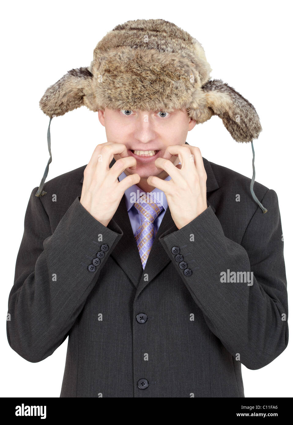 Emotional comico uomo russo nel cappello di pelliccia Foto stock - Alamy