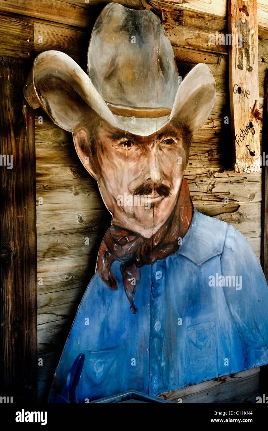 Cowboy parte di testa di un vecchio cartellone Foto Stock