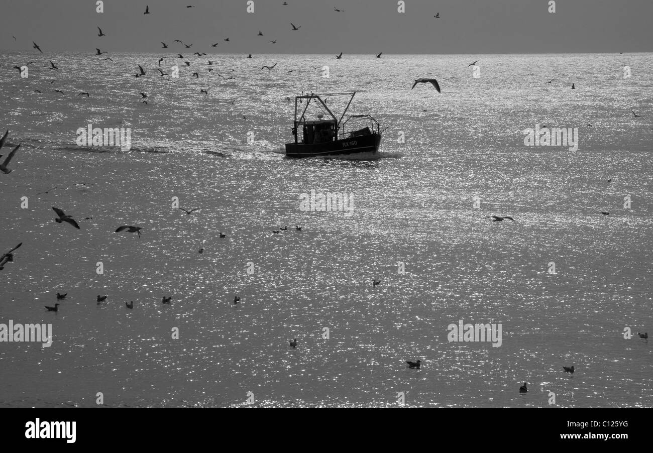 Tornando a casa a Hastings in east sussex coast Foto Stock