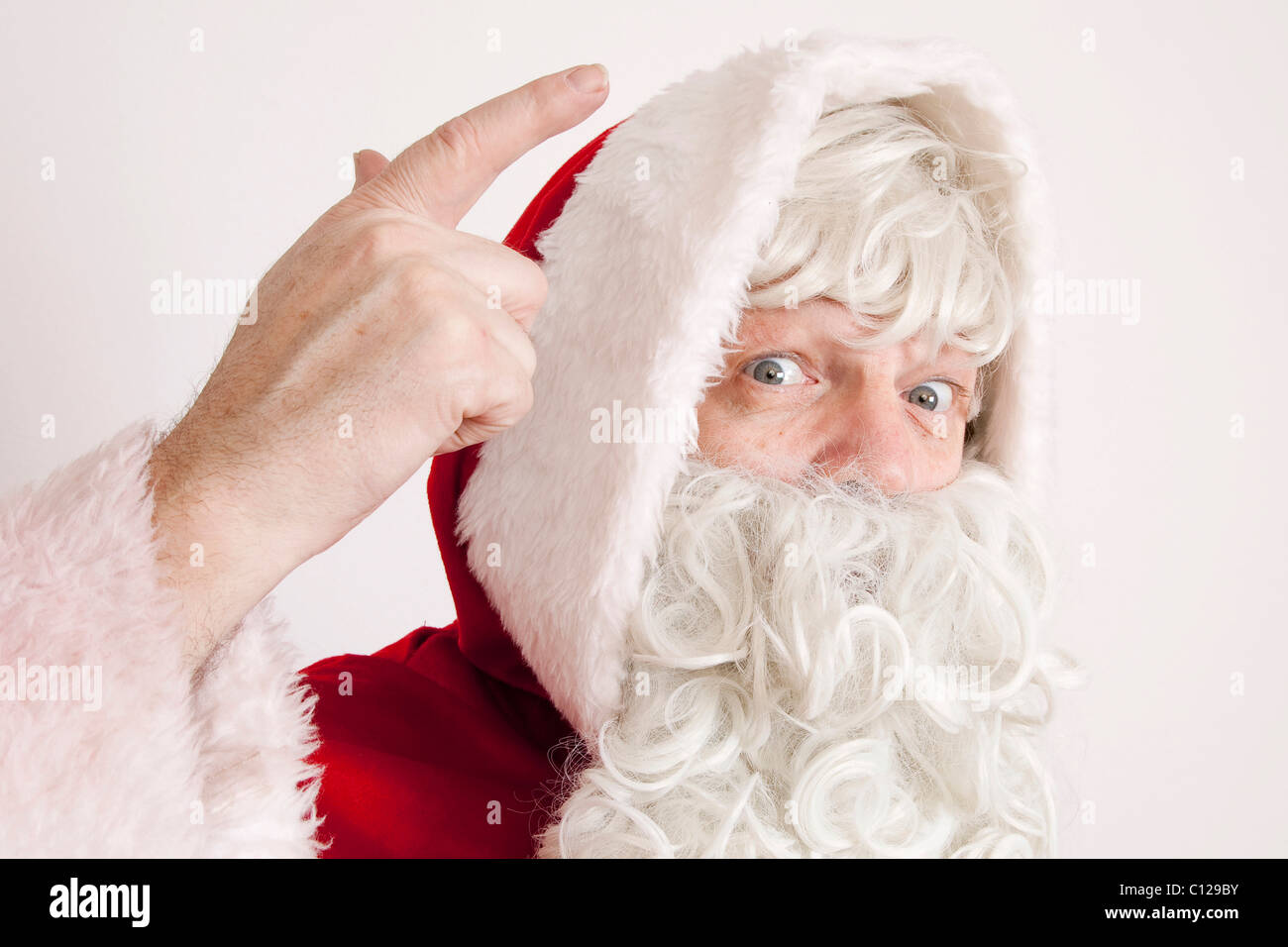 Santa Claus minaccioso, scodinzolante il suo dito Foto Stock