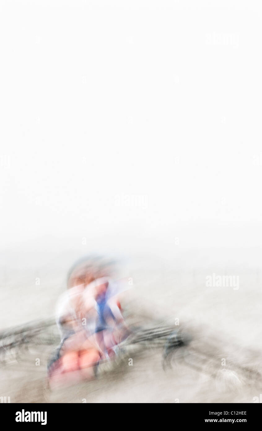 La sfocatura movimento di due vogatori sul Fiume Potomac a Washington, DC. Foto Stock