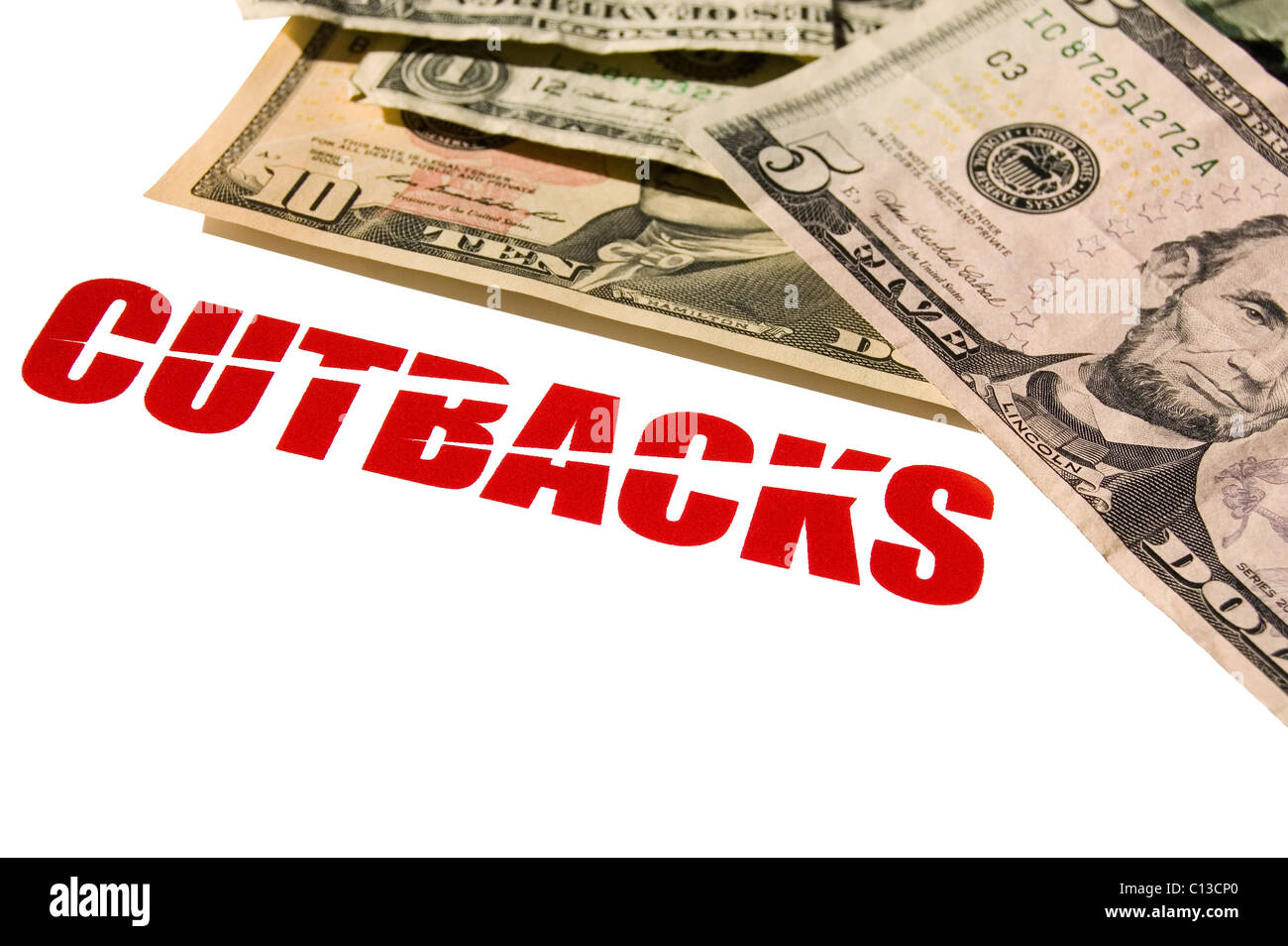 Close-up di noi le fatture del dollaro e l'evidenziazione del testo tagli. Contrasto elevato con copia sgranate. Copia dello spazio. Foto Stock