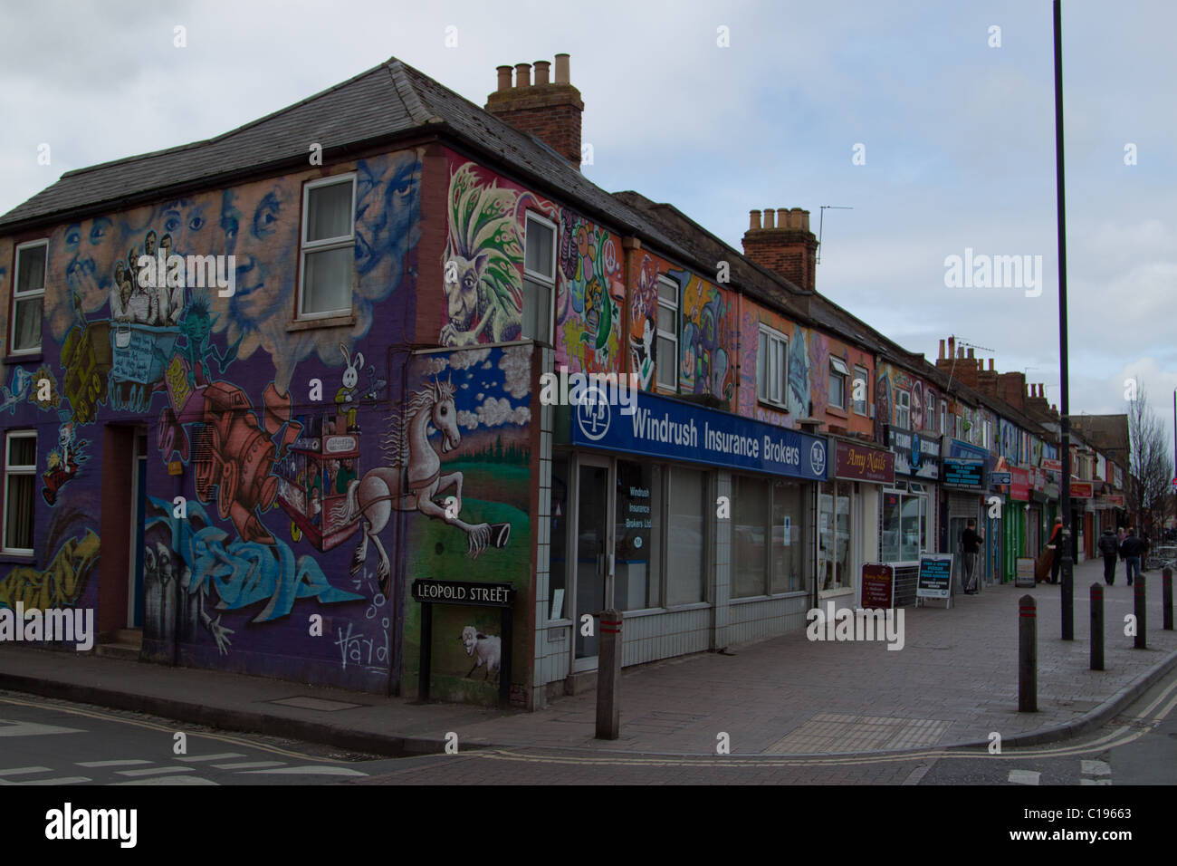 Graffiti su edifici lungo Cowley Road, Oxford Foto Stock
