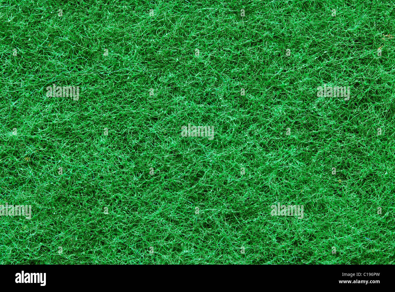 Immagine macro di verde sintetico meterial fibroso Foto Stock