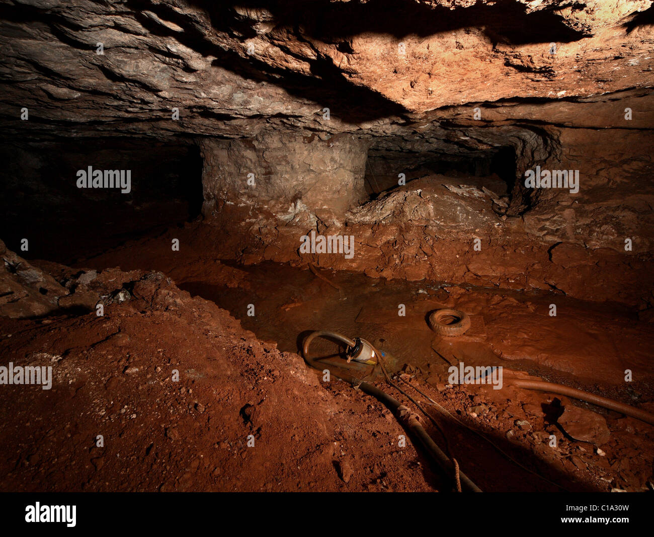 La coppa in una miniera per rimuovere acqua Foto Stock