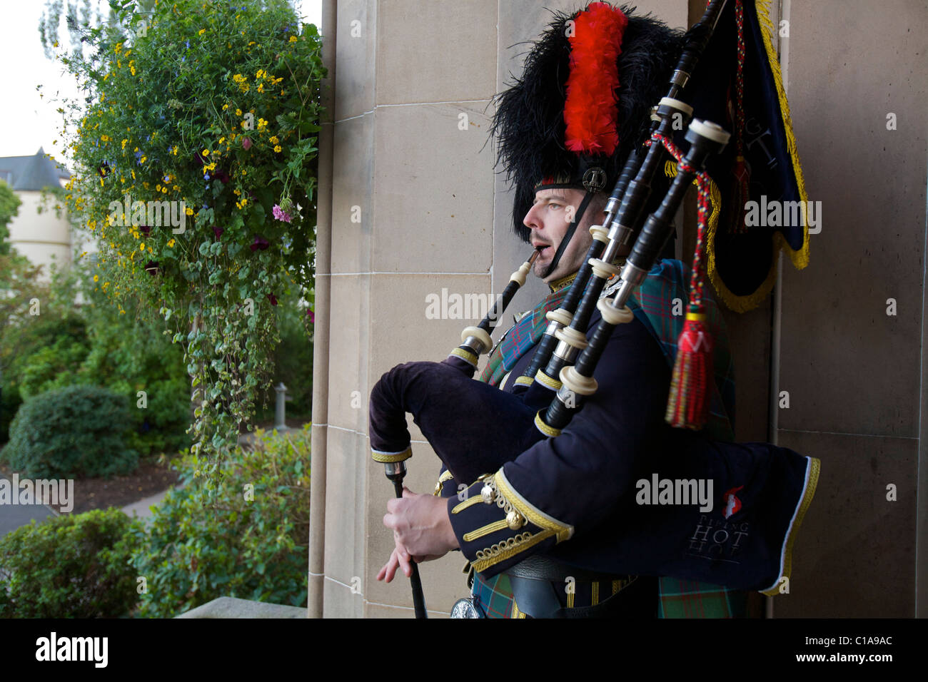 Scottish bagpiper. Foto Stock