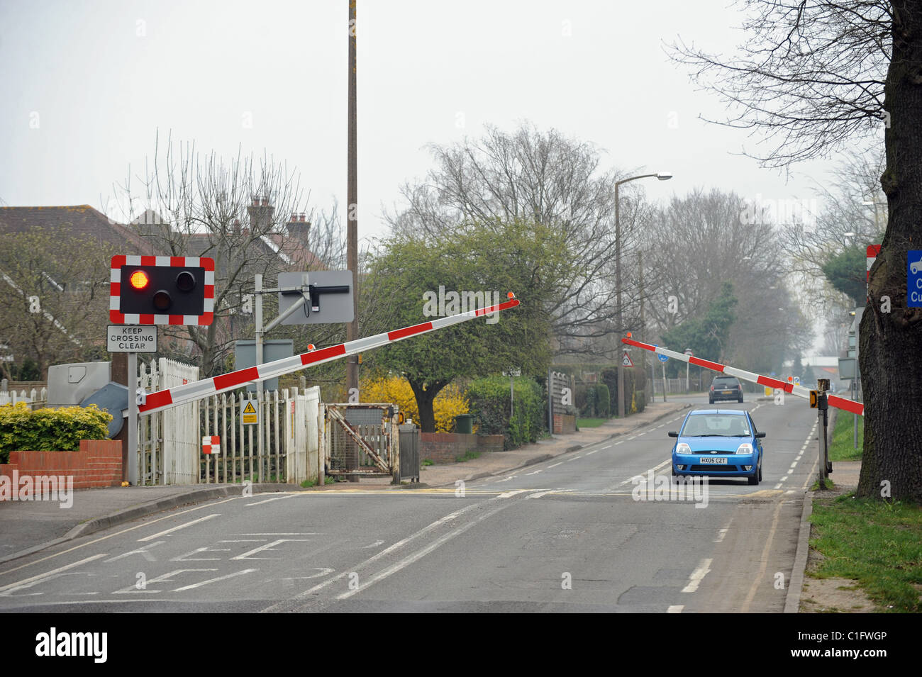 Incrocio ferroviario barriera a Road Horsham East Sussex Regno Unito Foto Stock