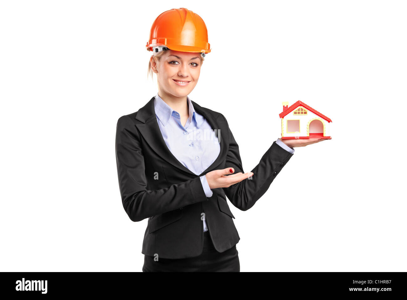 Un forewoman tenendo un modello di casa Foto Stock