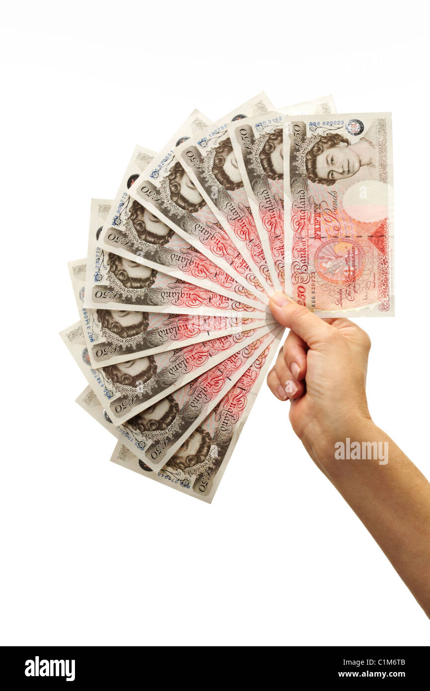 Fan di cinquanta Pound note con la mano Foto Stock