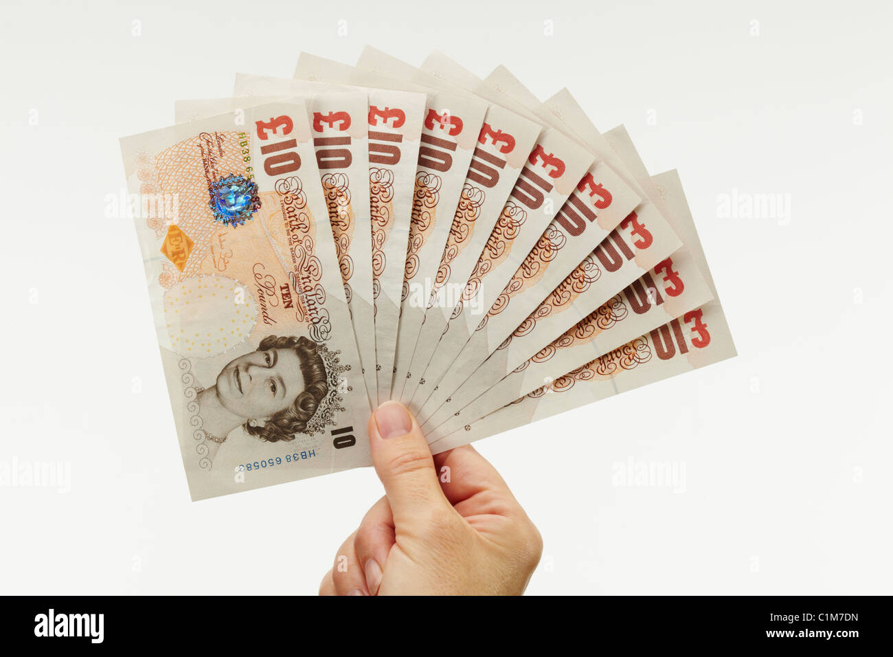 Fan di dieci Pound note con la mano Foto Stock