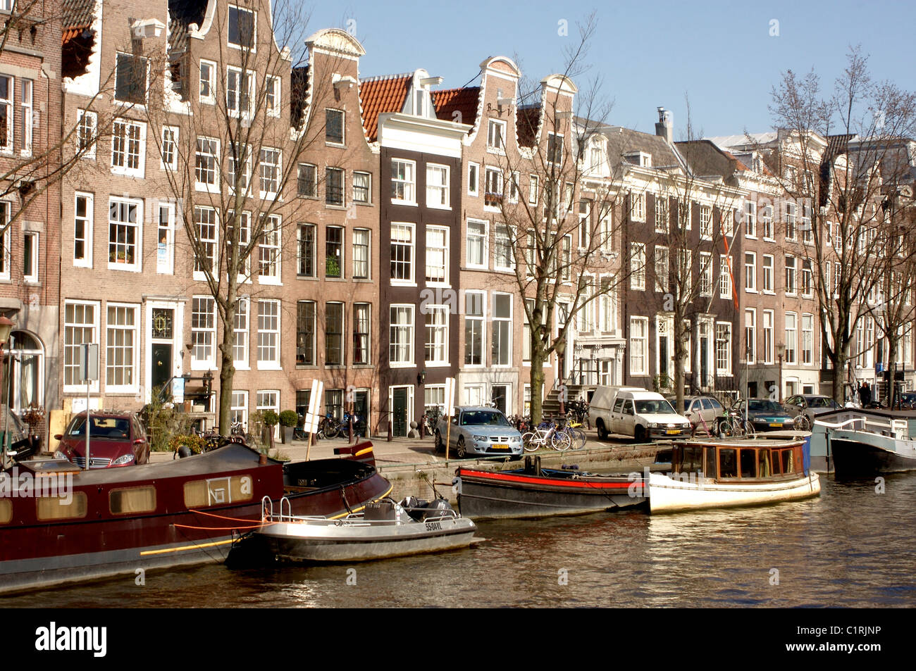 Commerciante olandese case lungo il canale Prinsengracht in Amsterdam Foto Stock