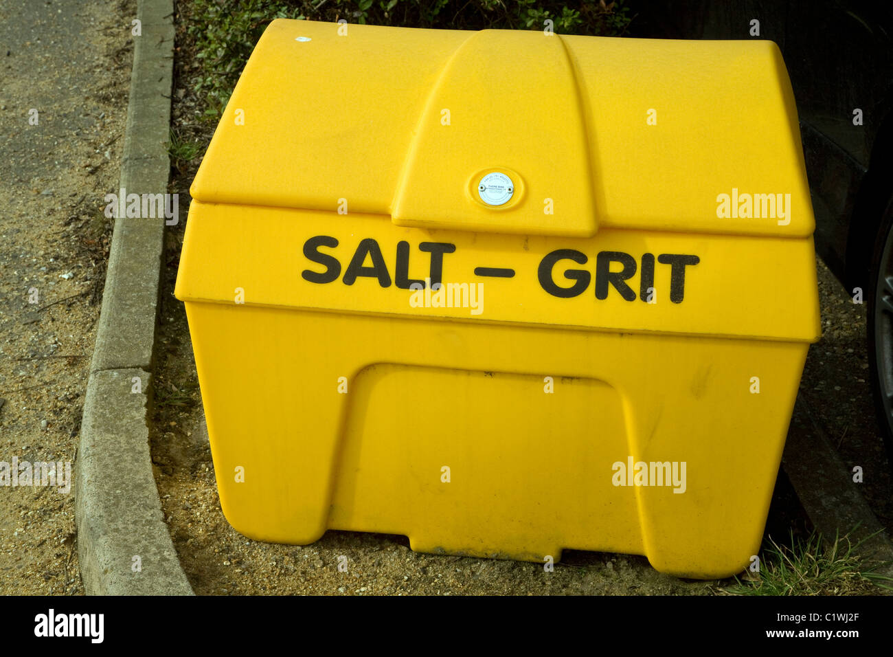 Sale giallo grinta contenitore da strada Foto Stock