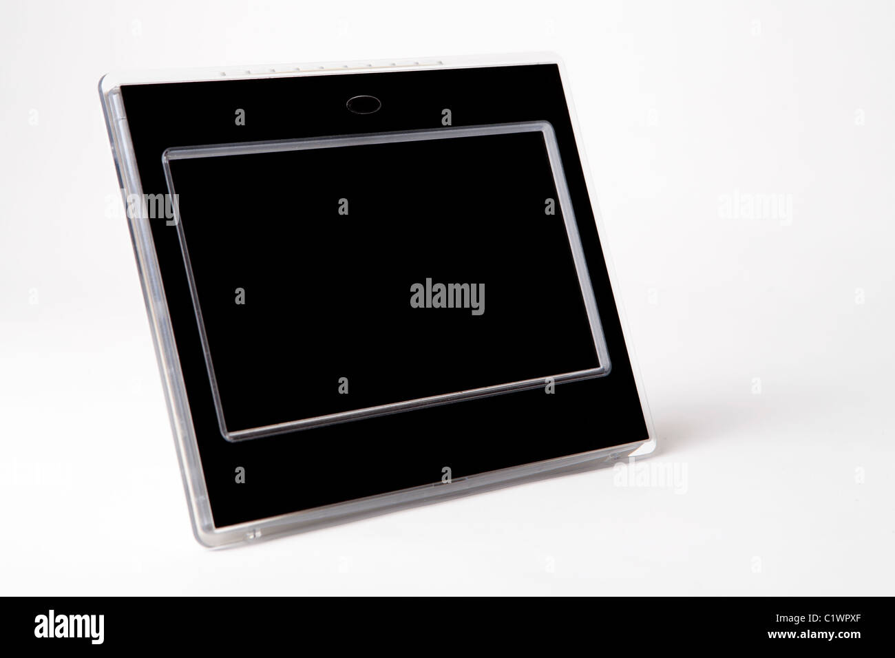 La tecnologia elettronica digitale cornice immagine su bianco con spazio per la copia Foto Stock