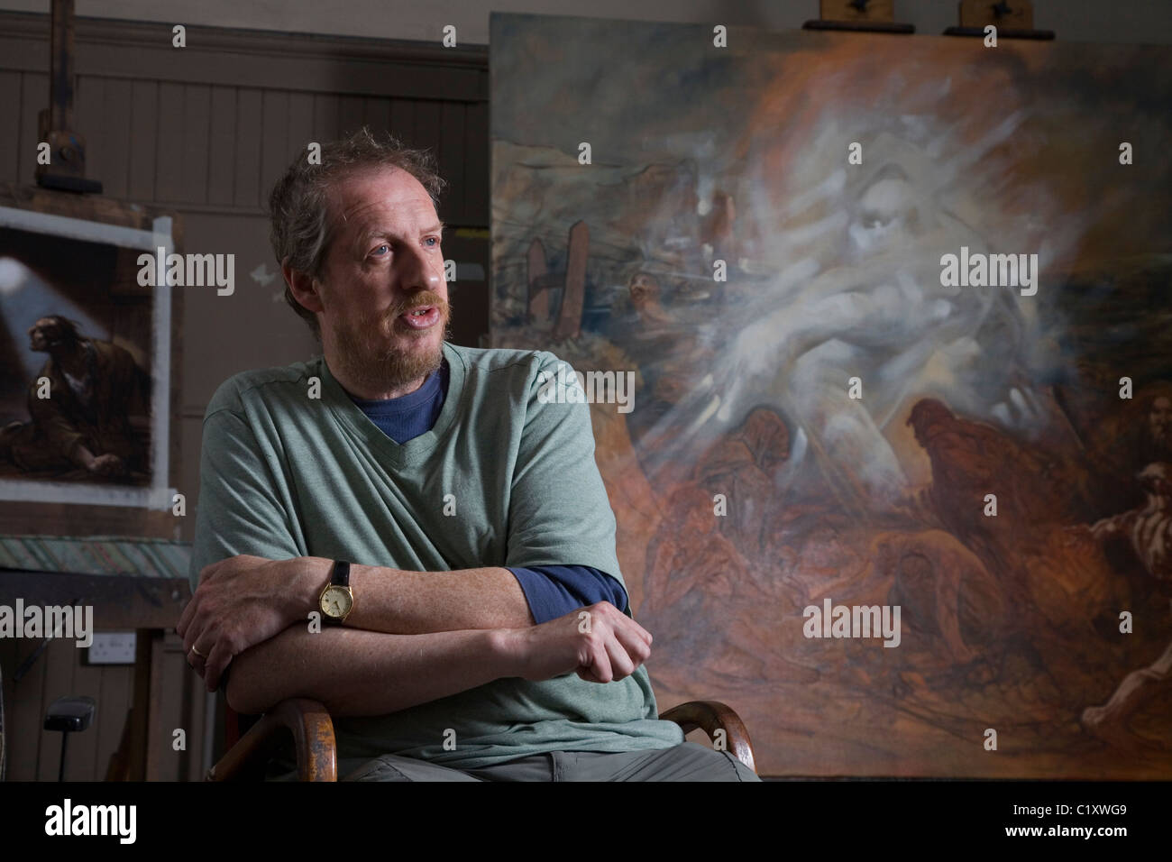 Artista scozzese Peter Howson nel suo studio di Glasgow. Foto Stock