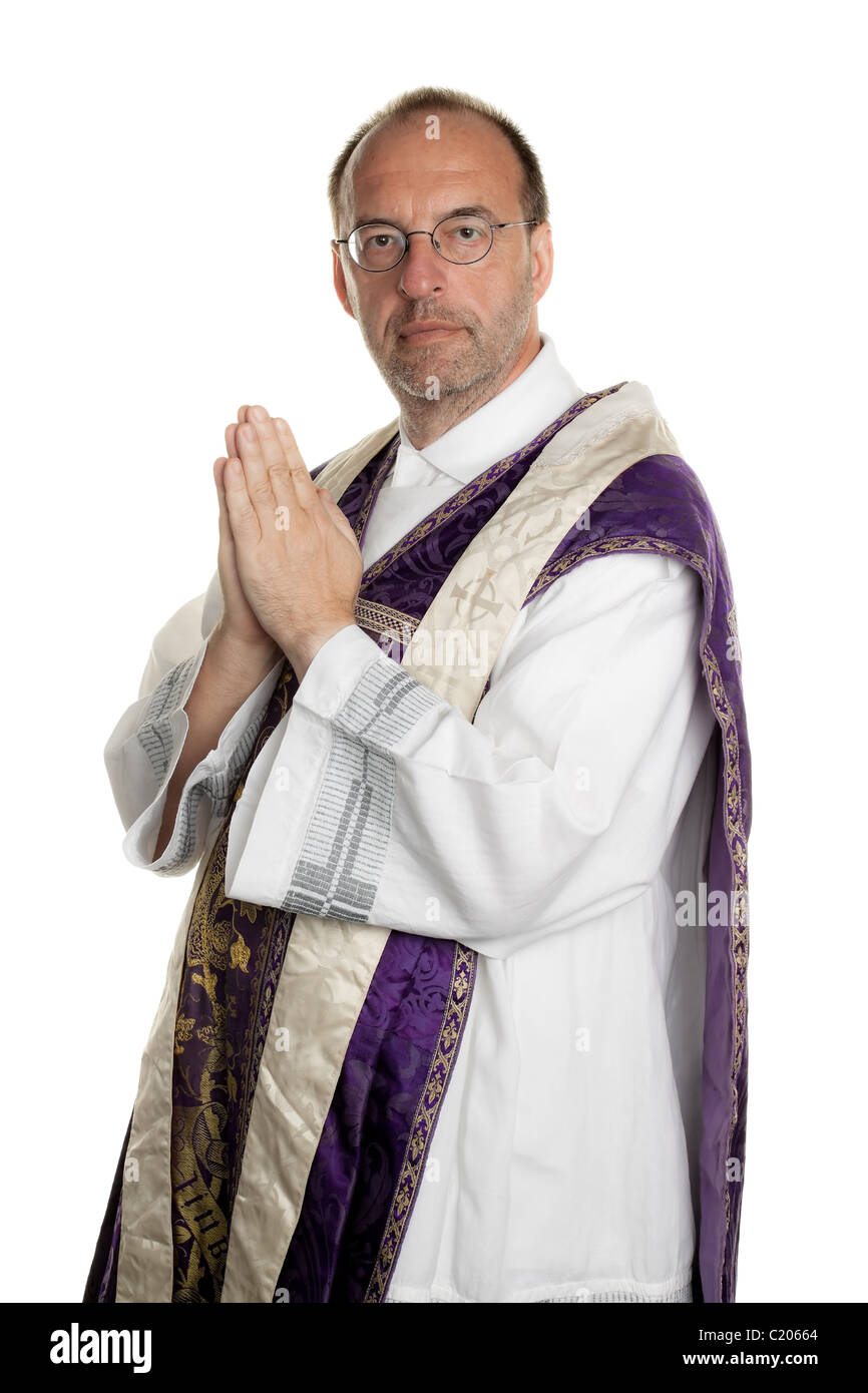 I sacerdoti cattolici in preghiera per il culto Foto Stock
