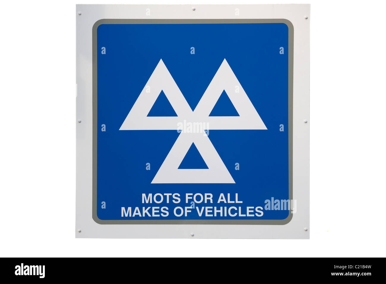 Tagliare MOT / MOTs segno / logo presso un garage che è anche un ministero dei Trasporti auto e test del veicolo e la stazione di servizio. Foto Stock