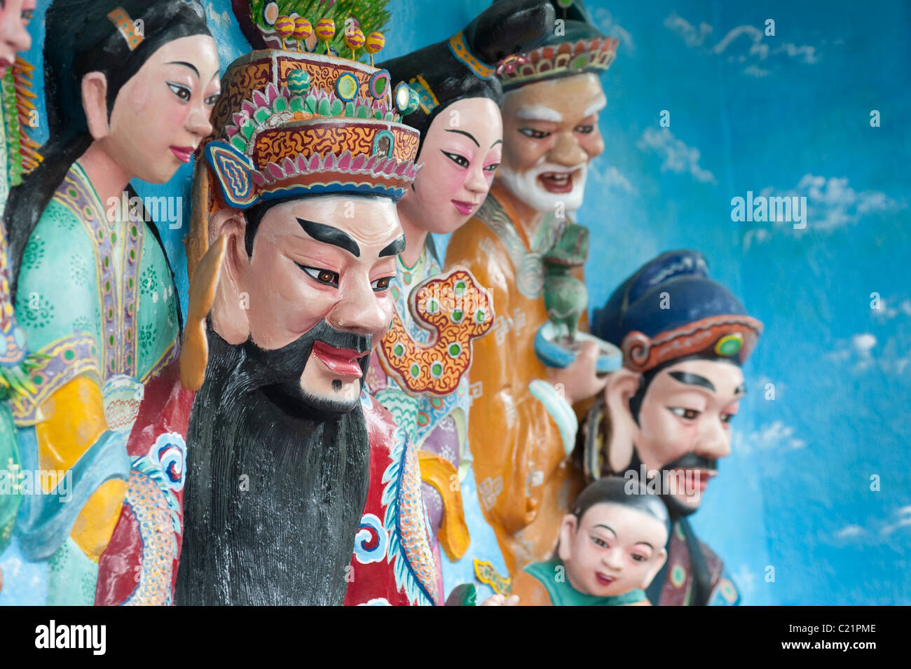 Sculture orientali alla Haw Par Villa, ex Tiger Balm Gardens. Un insolito orientali del parco a tema di Singapore Foto Stock