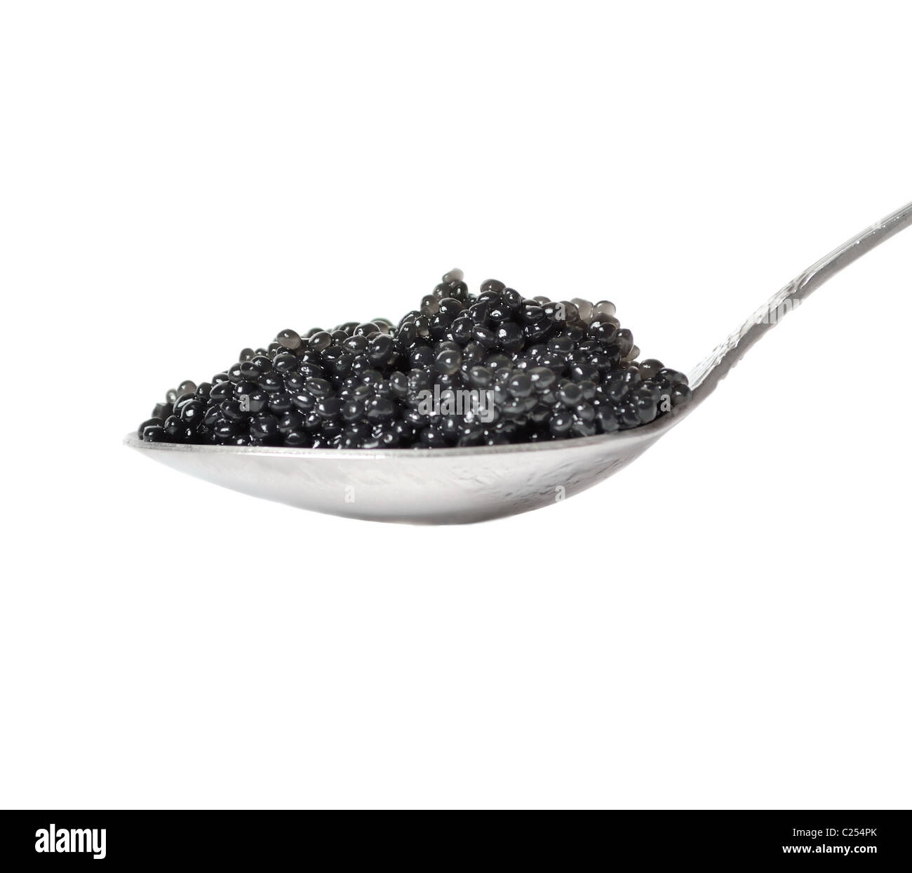 Il caviale nero in cucchiaio Foto Stock