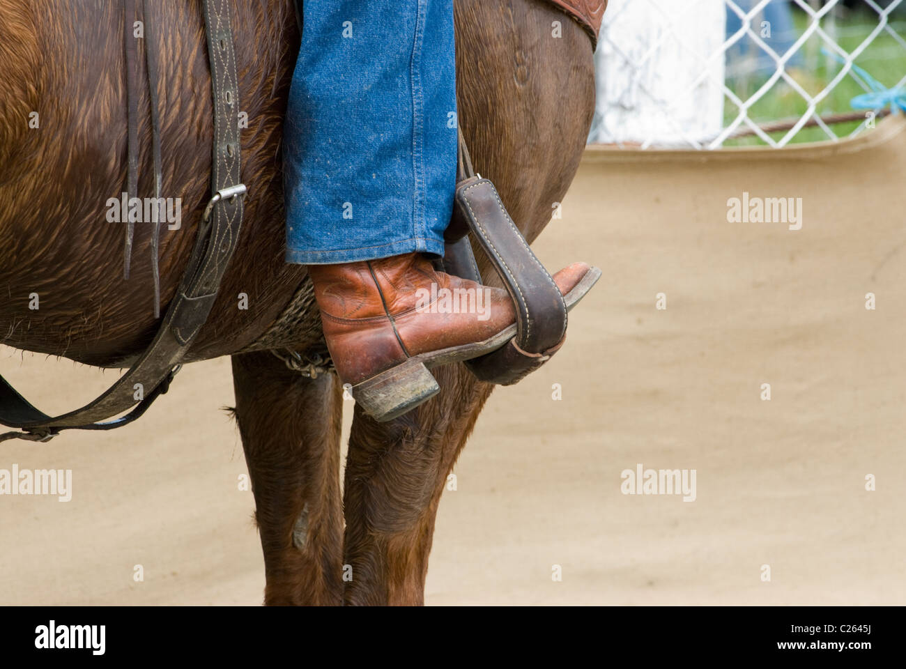 Methven rodeo - cowboy boot e jeans gamba rivestito in Western staffa Foto Stock