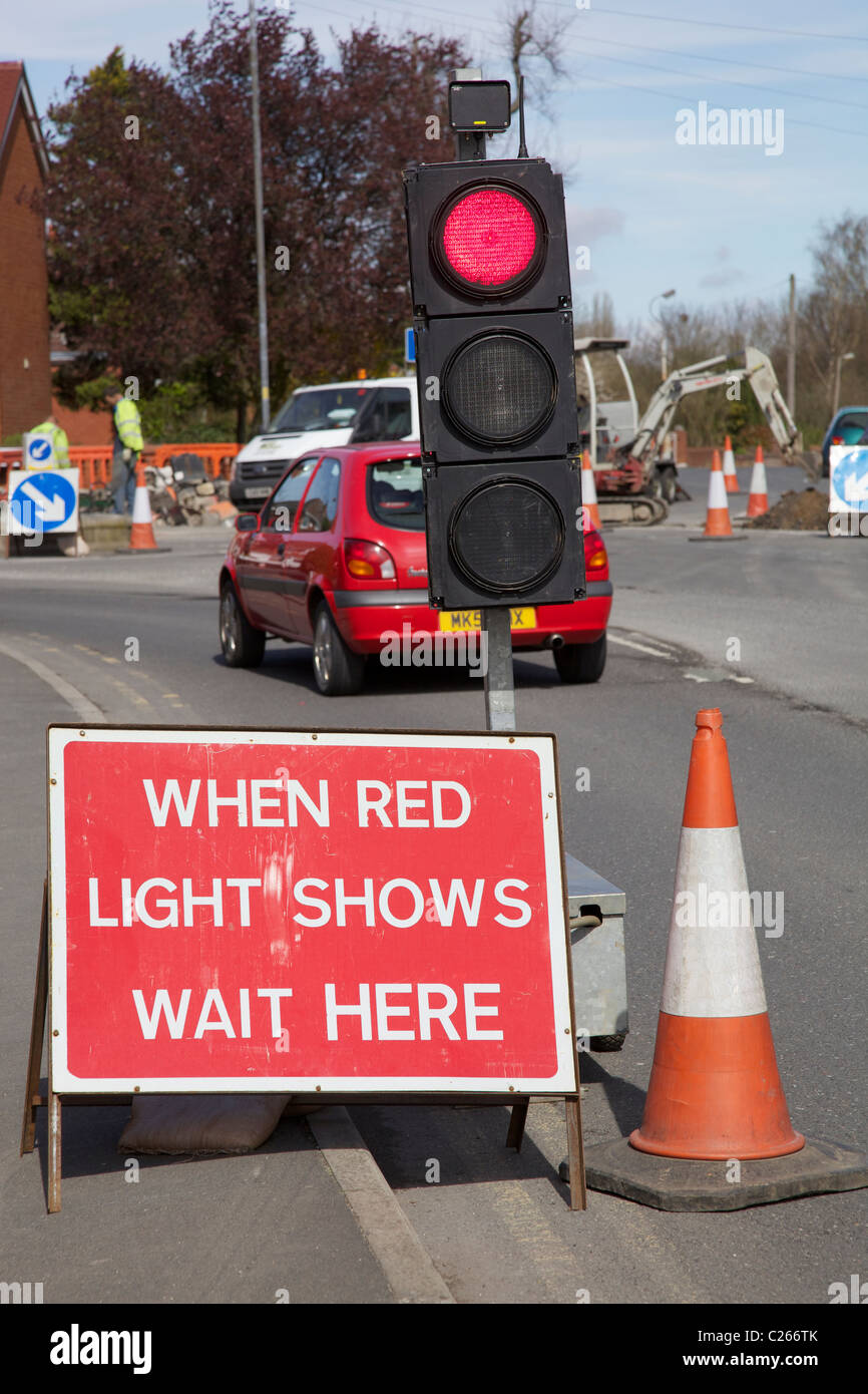 Red Semafori provvisori in corrispondenza di opere stradali. Foto Stock