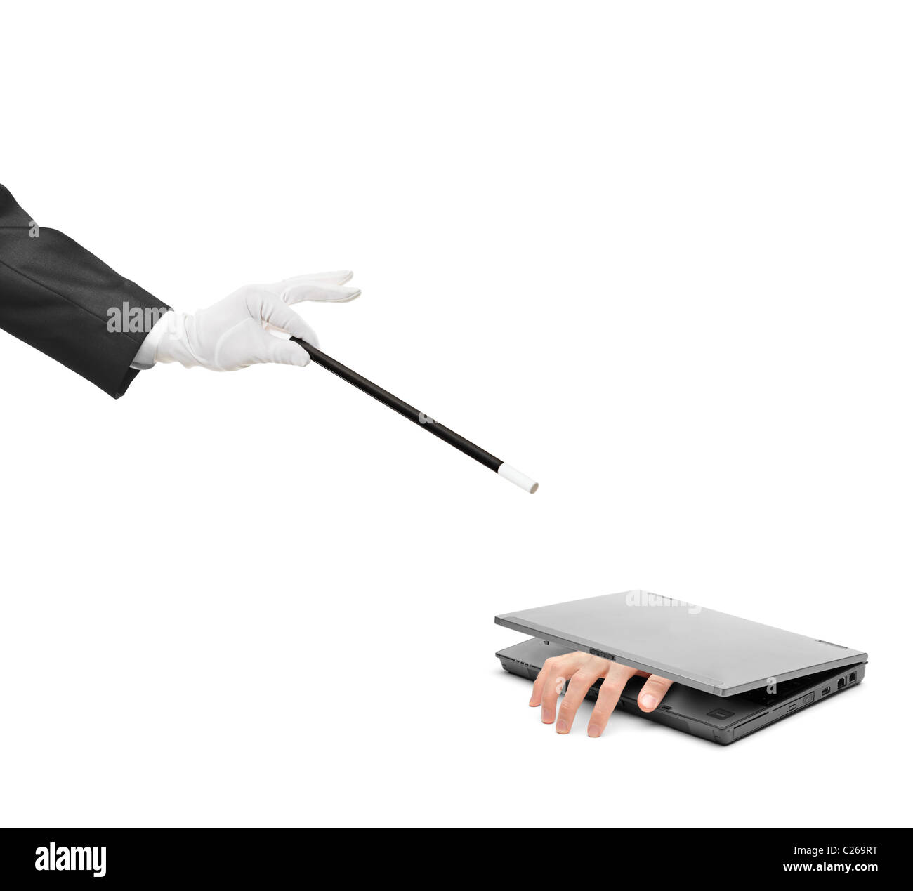 Una mano di raggiungere fuori da un computer portatile e la mano che regge una bacchetta magica Foto Stock