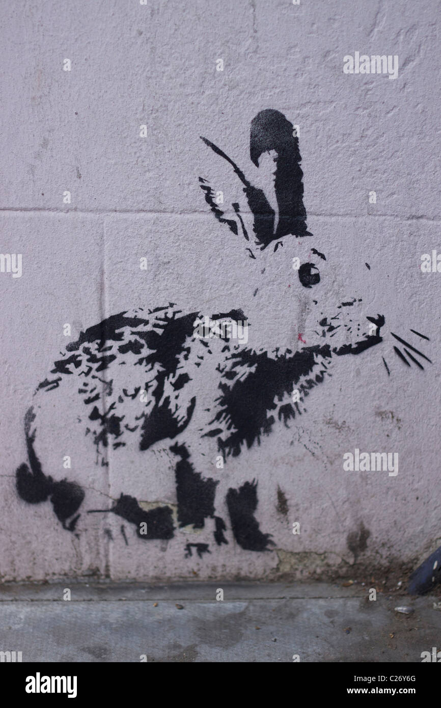 Banksy tipo impresse la street art di un coniglio in Church street a Stoke Newington Hackney Foto Stock