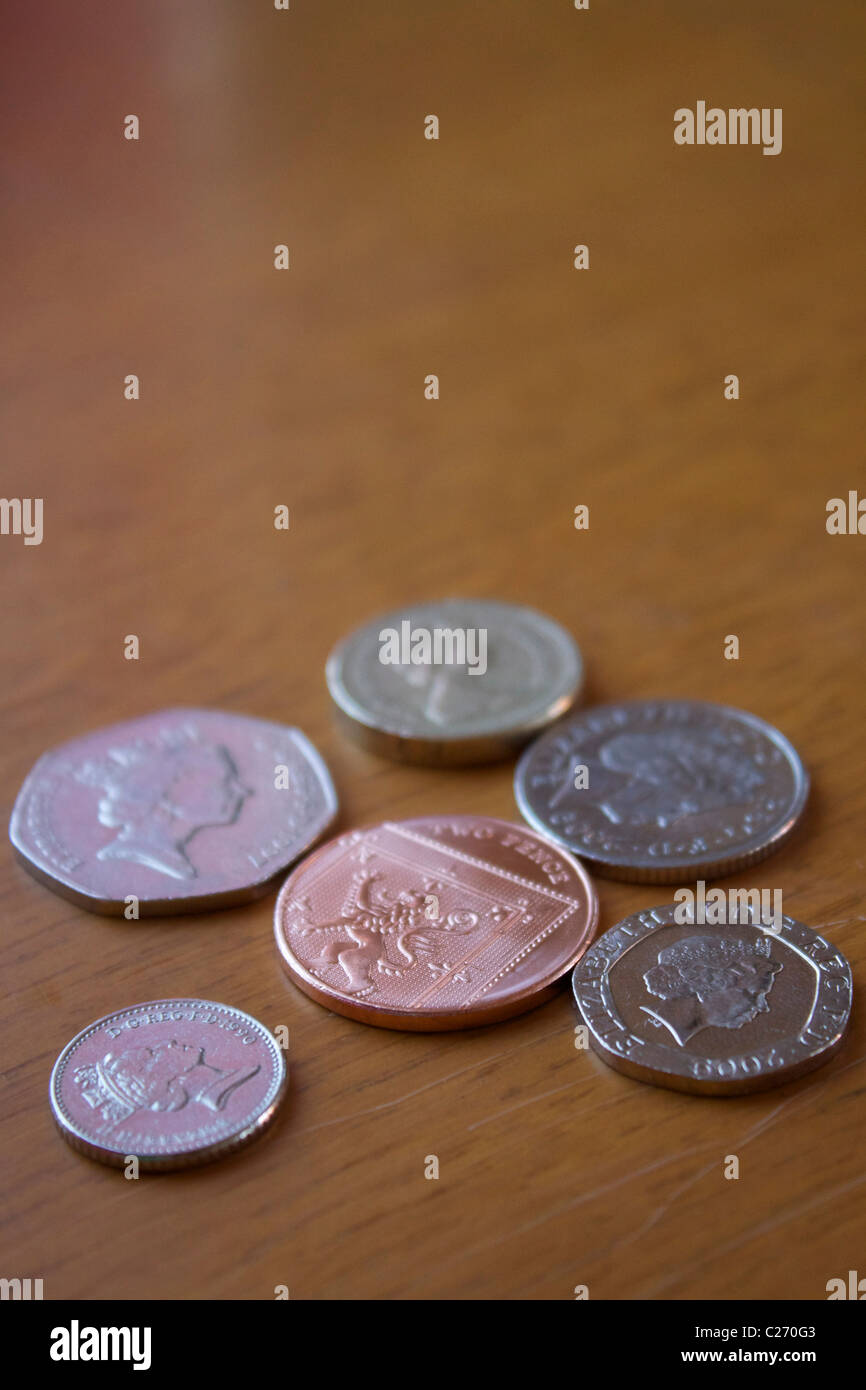 Sterlina inglese delle monete in euro Foto Stock