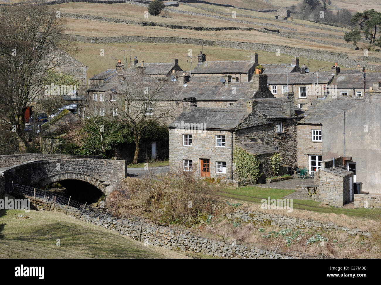 Il villaggio di Thwaite, Swaledale, Yorkshire Dales, England, Regno Unito Foto Stock