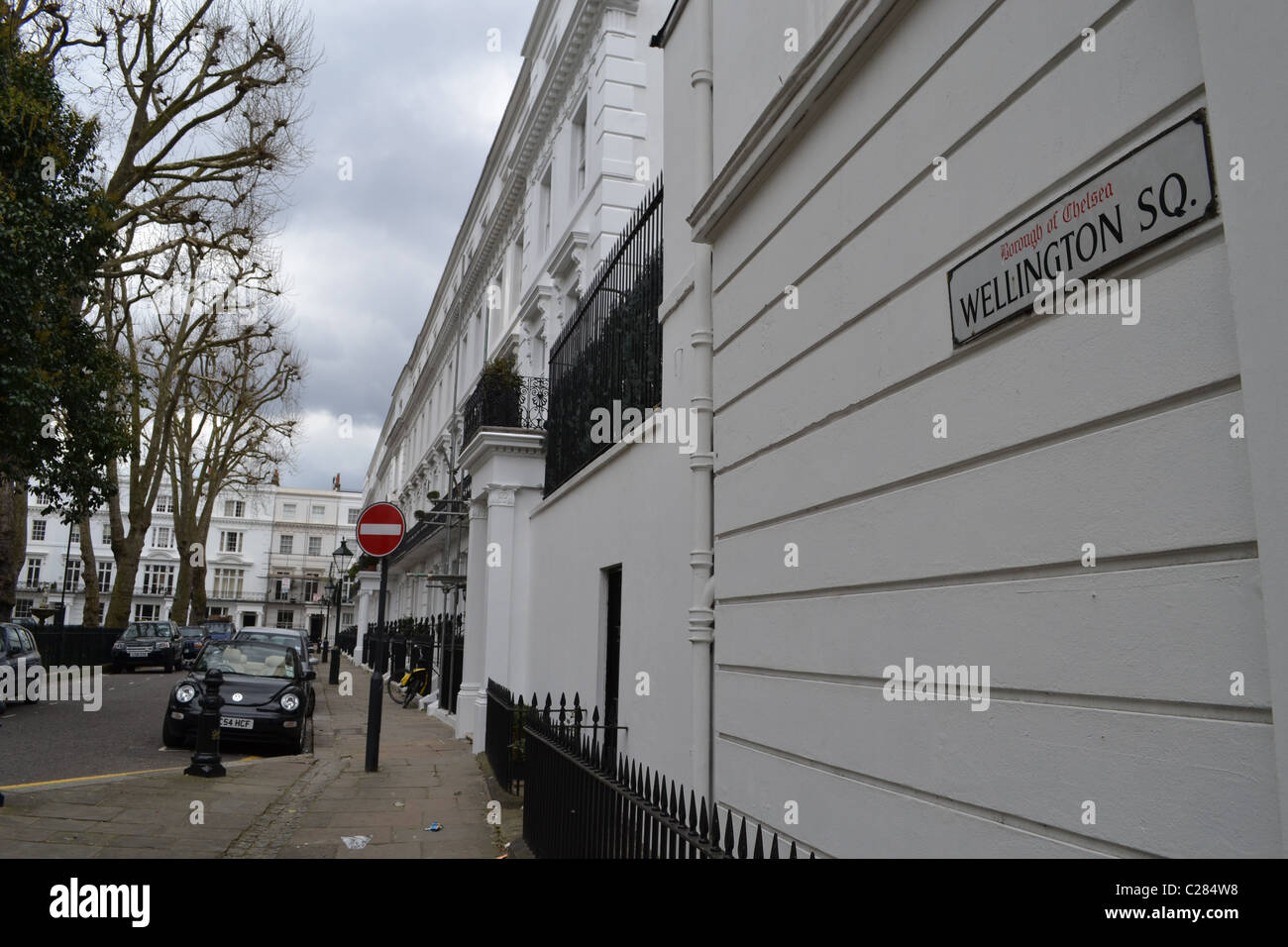 Favoloso con facciata in stucco case in Wellington Square, a Chelsea, Londra, Regno Unito ARTIFEX LUCIS Foto Stock