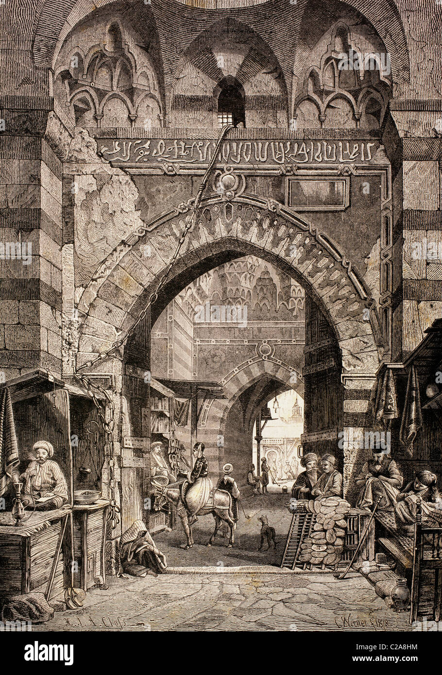 Ingresso al Khan el-Khalili souk o mercato del Cairo in Egitto nel XIX secolo. Foto Stock